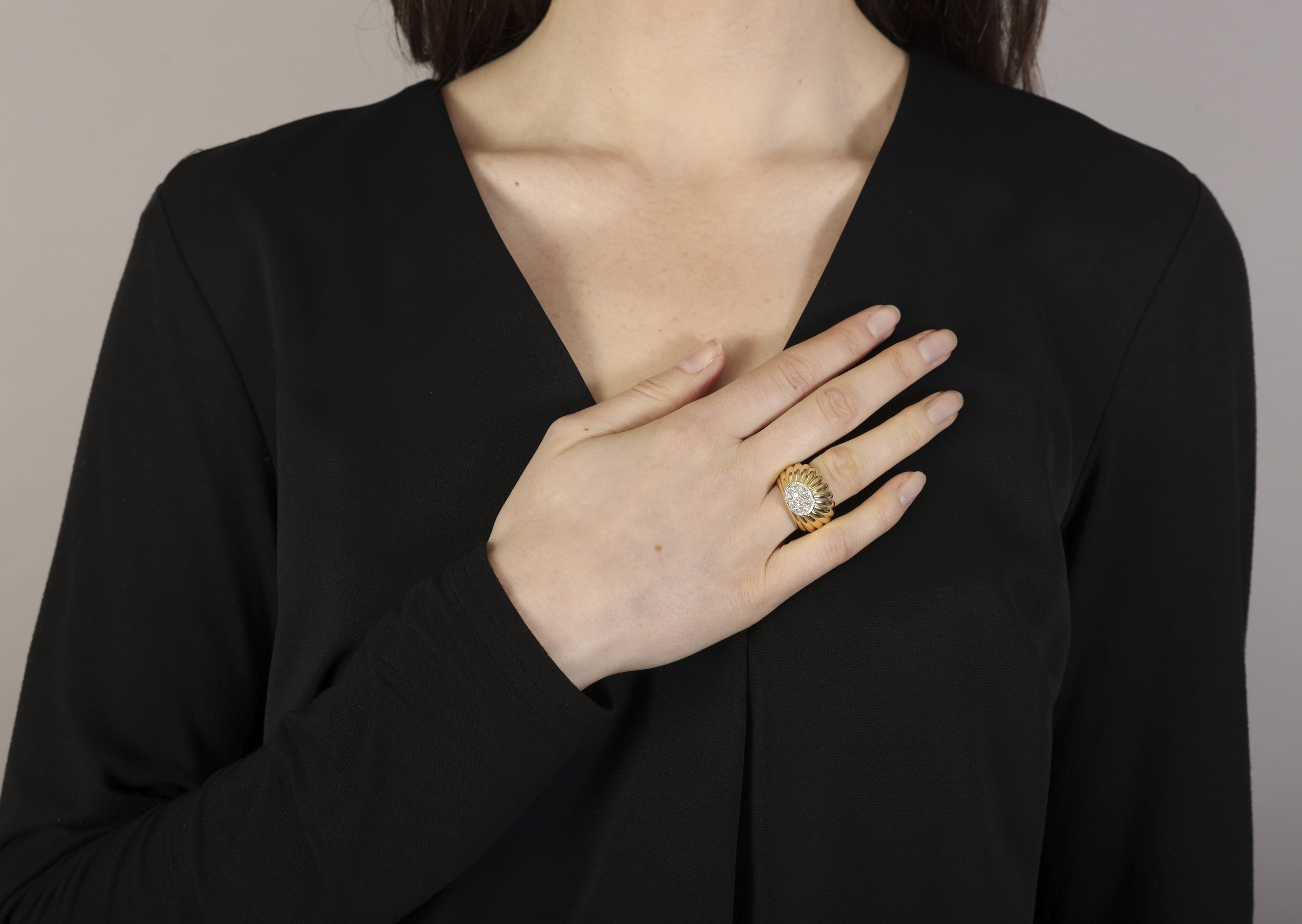 A DIAMOND DRESS RING Of bombé fluted design, centrally set with brilliant-cut diamonds, mounted in - Image 4 of 5