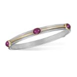 A RUBY BANGLE, BY TIFFANY & CO, CIRCA 1997 Composed of five oval-shaped ruby cabochons within