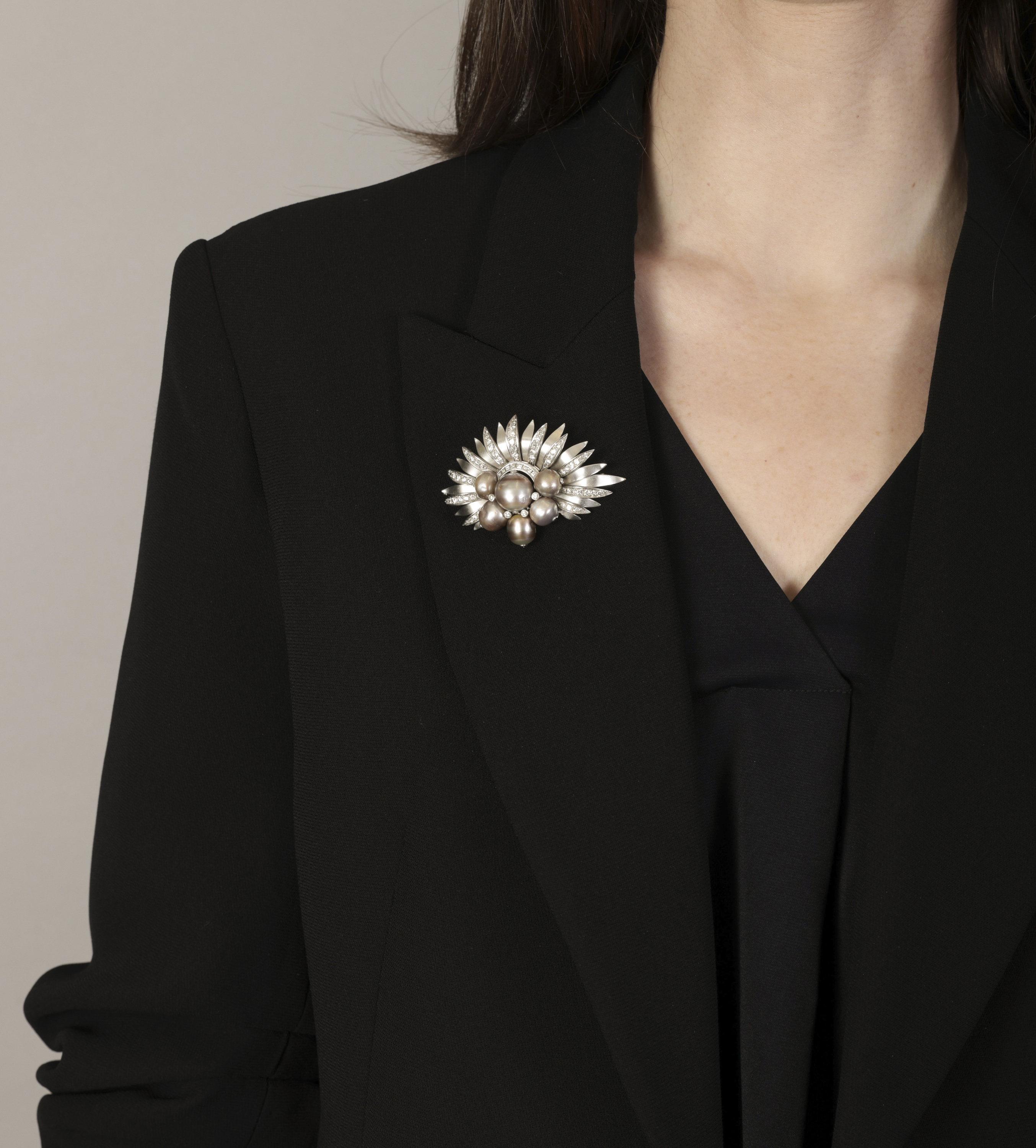 A CULTURED PEARL AND DIAMOND BROOCH, CIRCA 1960 Of fan-shaped palm design, centring a cultured pearl - Image 3 of 4