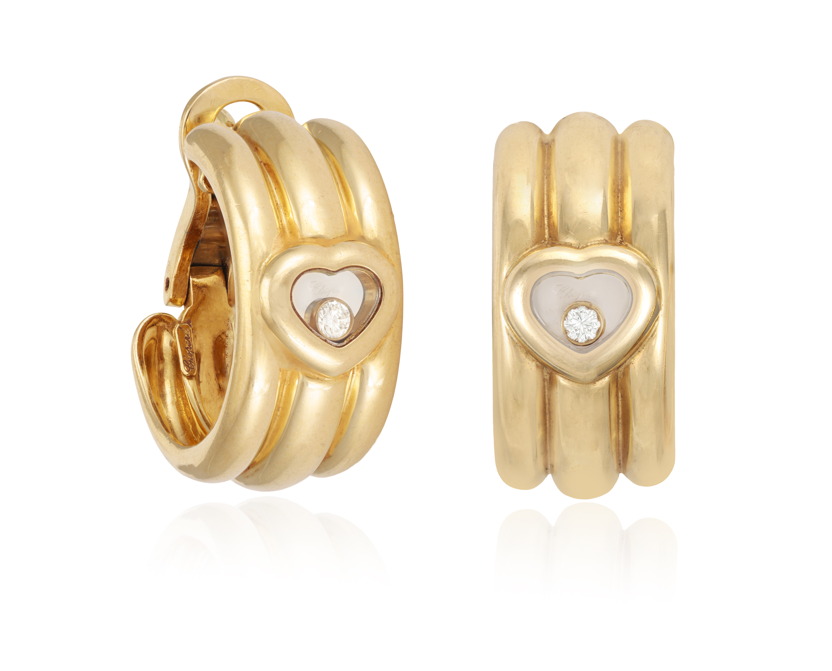 A PAIR OF 'HAPPY DIAMONDS' EARRINGS, BY CHOPARD Each reeded hoop accented with a central heart- - Image 2 of 4