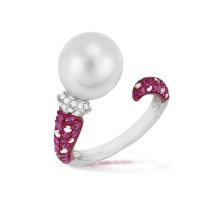 A CULTURED PEARL, RUBY AND DIAMOND DRESS RING The round-shaped cultured pearl of white tint