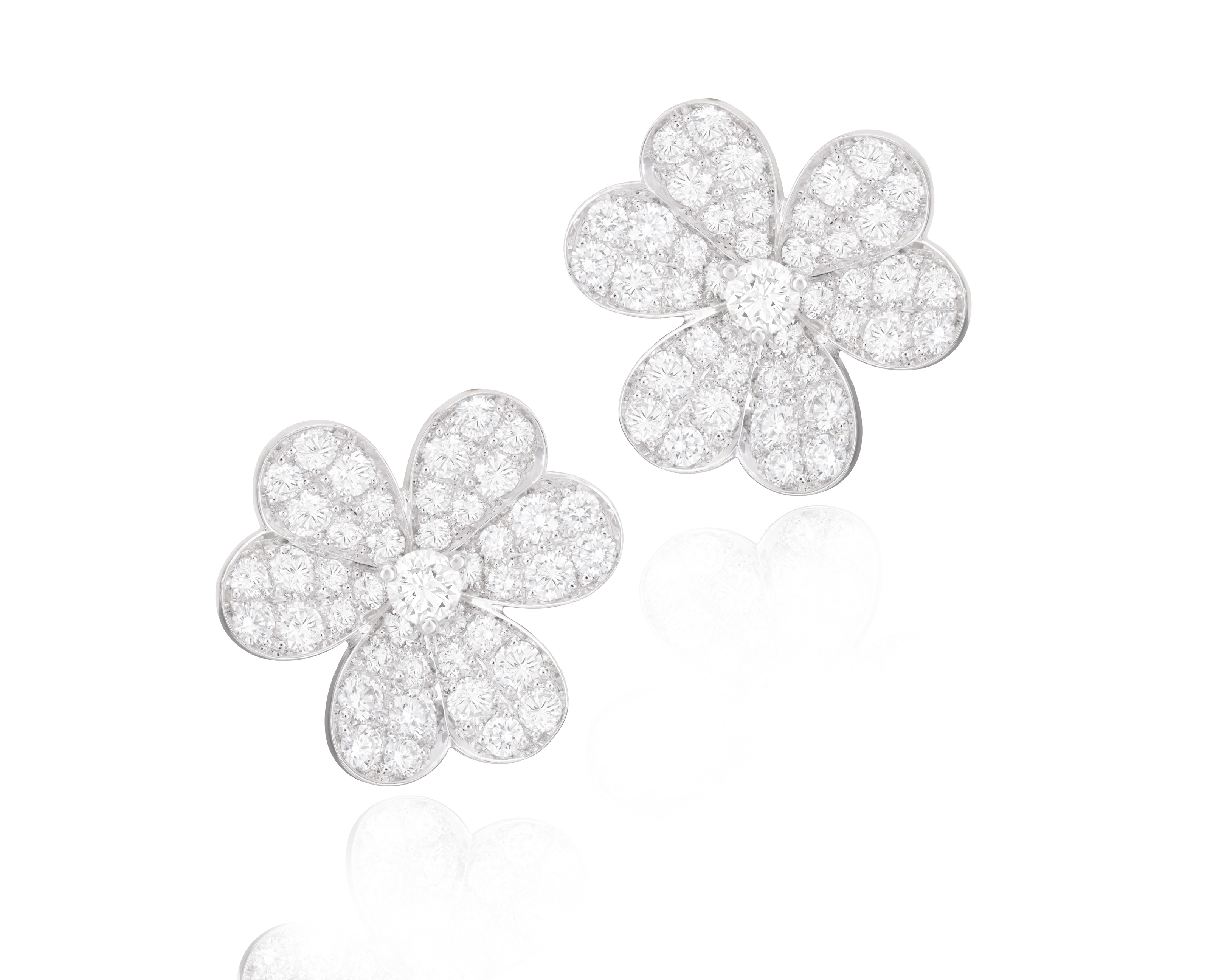 A PAIR OF DIAMOND 'FRIVOLE' EARRINGS, BY VAN CLEEF & ARPELS Each flowerhead centring a brilliant-cut