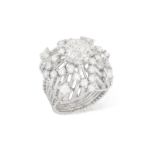 A DIAMOND DRESS RING, FRENCH, CIRCA 1960 Of openwork domed design, the central old brilliant-cut