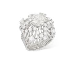 A DIAMOND DRESS RING, FRENCH, CIRCA 1960 Of openwork domed design, the central old brilliant-cut