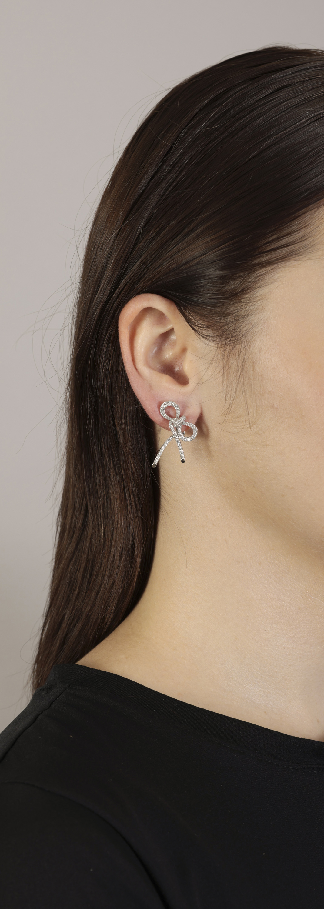 A PAIR OF DIAMOND EARRINGS, BY MARGHERITA BURGENER Each designed as a stylised bow, pavé-set with - Image 2 of 2