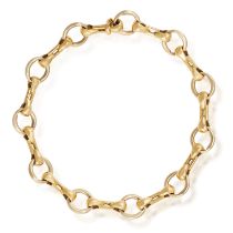 AN 18K GOLD BRACELET, BY CARTIER Composed of polished circular links and stylised baton-shaped