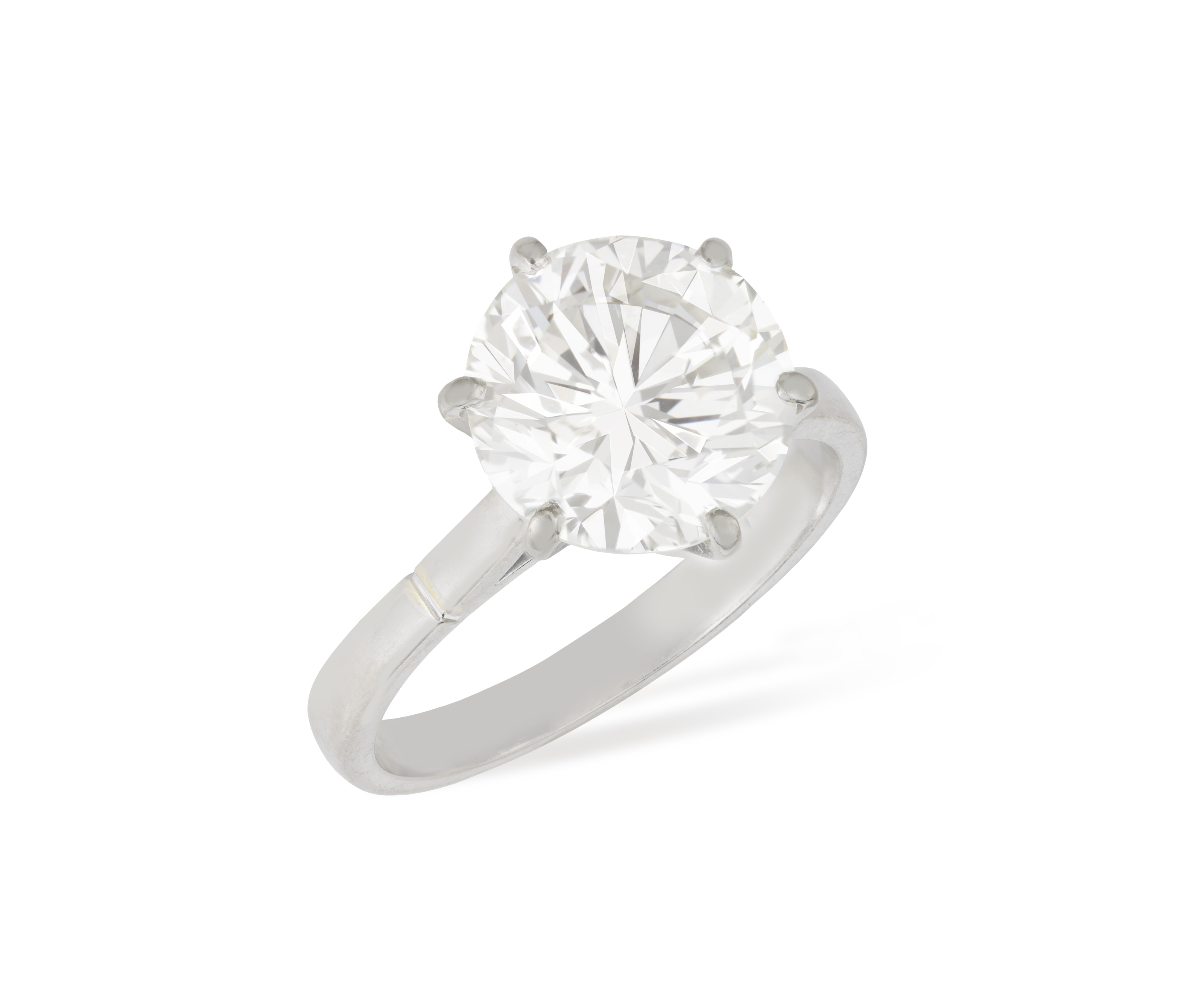 A DIAMOND SINGLE-STONE RING The European-cut diamond weighing approximately 3.10cts, within a six-