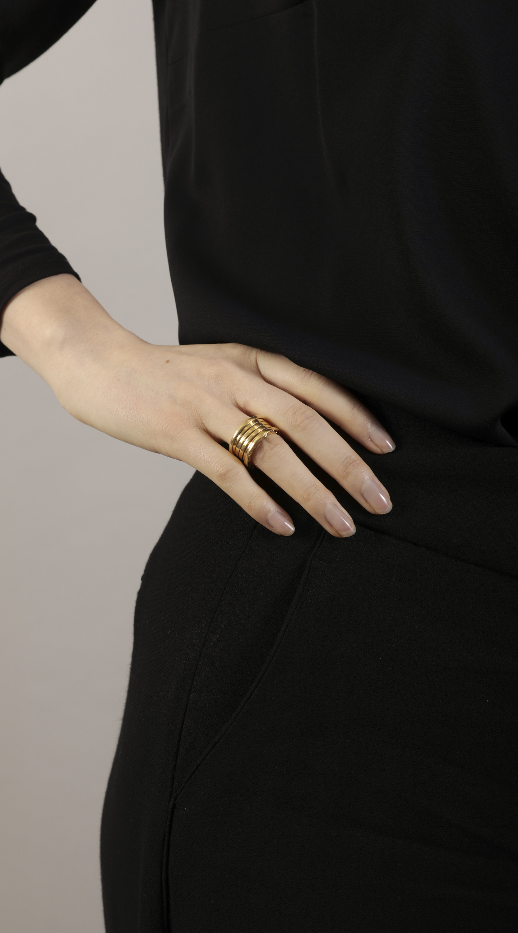A GOLD 'B-ZERO 1' RING, BY BULGARI The polished segmented band, both sides of the ring engraved ' - Image 6 of 6