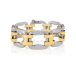 A SILVER AND GOLD BRACELET, BY HERMÈS Of openwork design, composed of polished silver links with