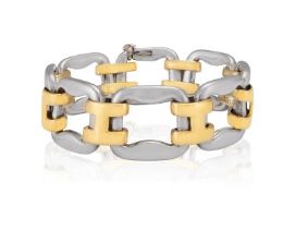 A SILVER AND GOLD BRACELET, BY HERMÈS Of openwork design, composed of polished silver links with
