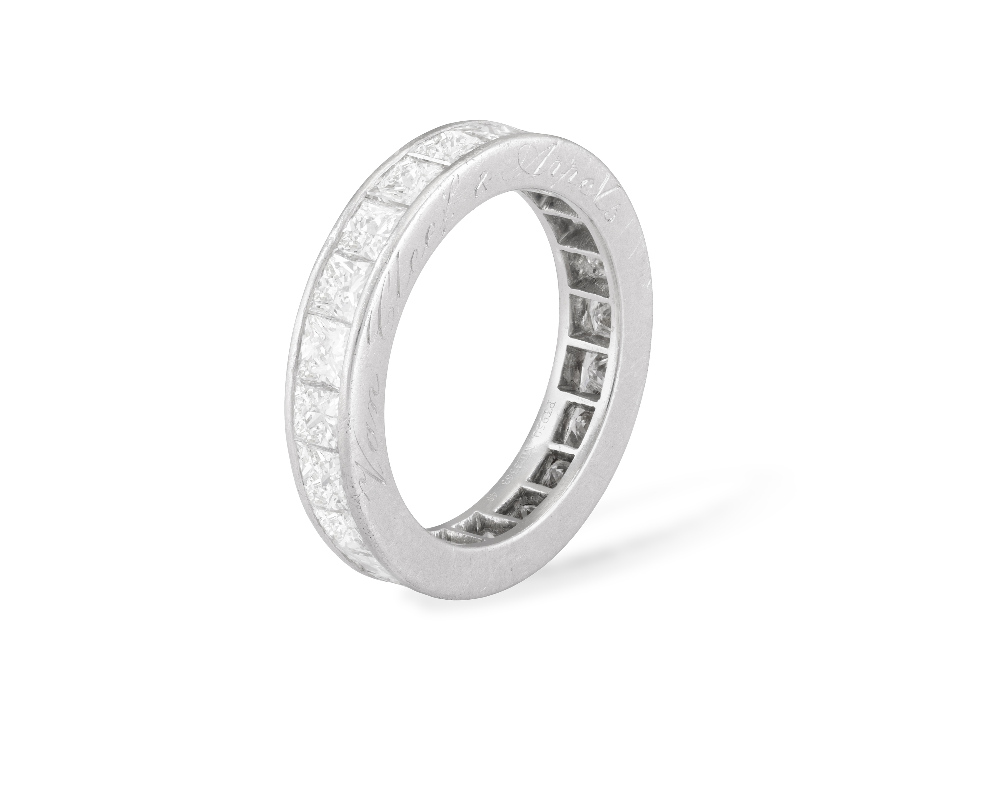 A DIAMOND ETERNITY RING, BY VAN CLEEF AND ARPELS Composed of a continuous row of princess-cut