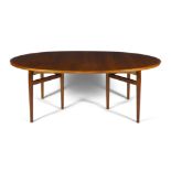 ARNE VODDER (1926-2009) A teak oval extending dining table with two leaves by Arne Vodder.