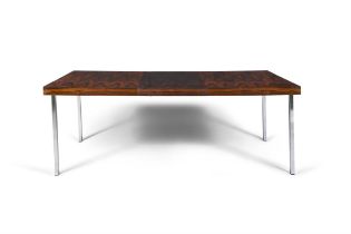 W.K. MOBEL A rosewood extending dining table by W.K. Mobel with hidden leaf with maker's label.