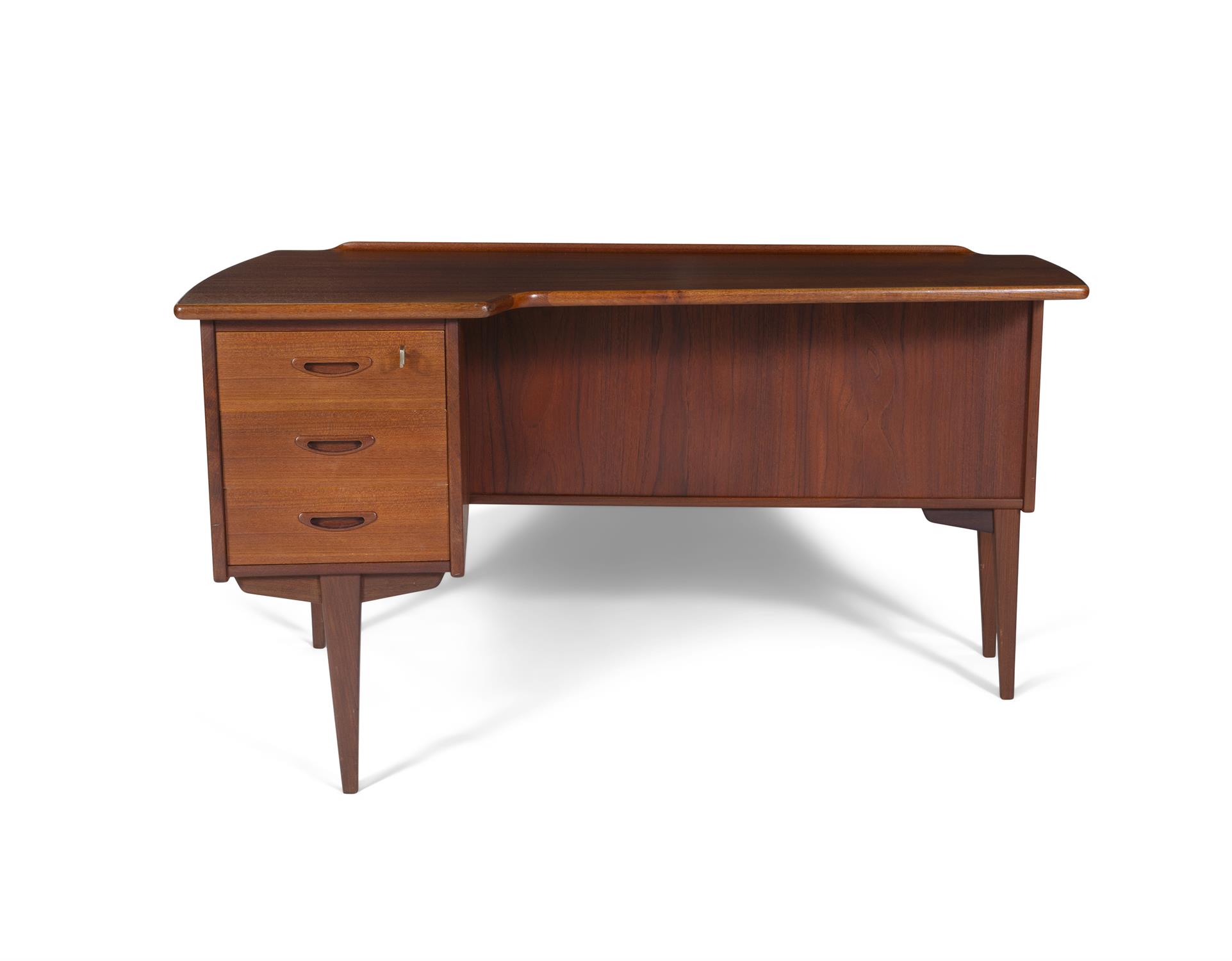 DESK A teak boomerang desk with three drawers and one drop down door with maker's label. Sweden, - Image 2 of 10
