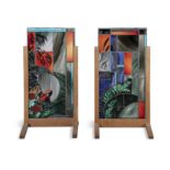 GLASS PANELS A pair of stained glass panels on oak stands. 66 x 48 x 130cm(h) including stands