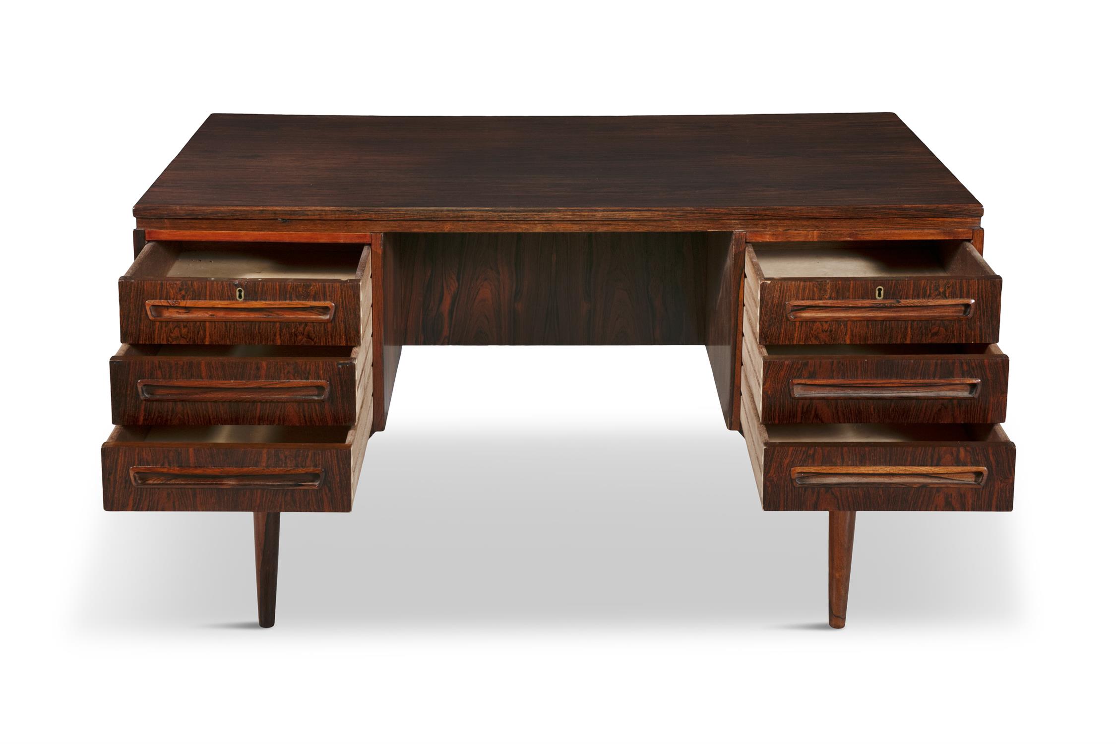 DESK A rosewood desk. Denmark, c.1960. 130 x 71 x 73cm(h) - Image 3 of 5