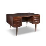 DESK A rosewood desk. Denmark, c.1960. 130 x 71 x 73cm(h)