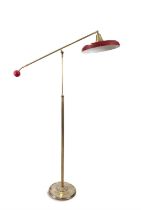 GAETANO SCIOLARI A brass floor lamp with red shade with counterbalance by Gaetano Sciolari with