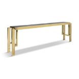 CONSOLE TABLE A brass plated console table with smoked glass top. Italy, c.1970. 195 x 29.