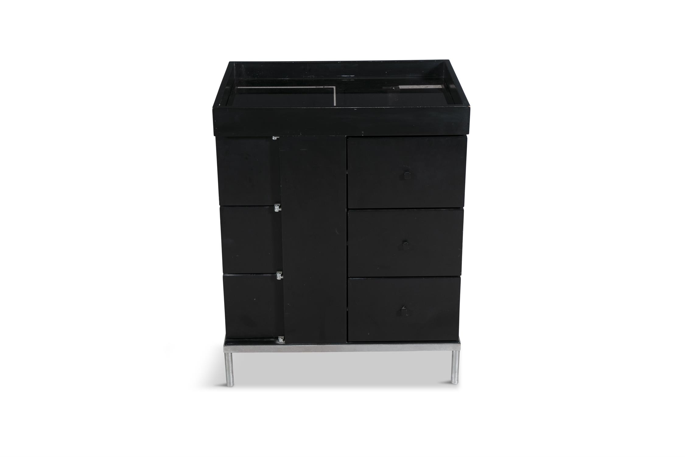 STORAGE CABINET A black melamine storage cabinet on a chrome base in the style of Eileen Gray. 60. - Image 3 of 4