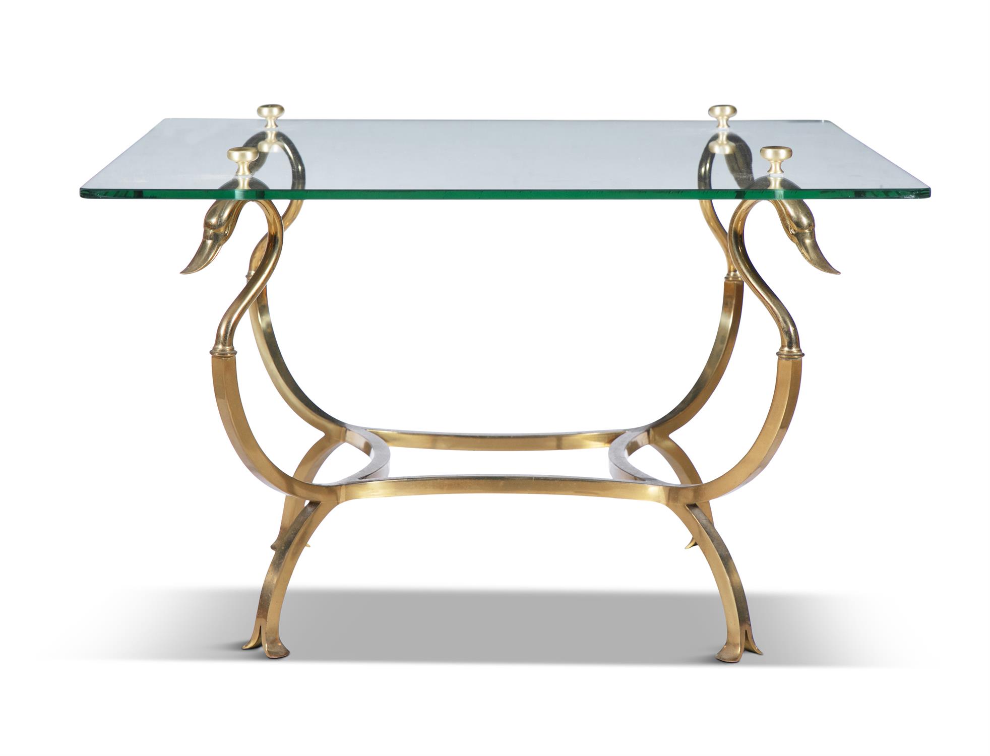 COFFEE TABLE A brass based coffee table with swan head supports and glass top, attributed to