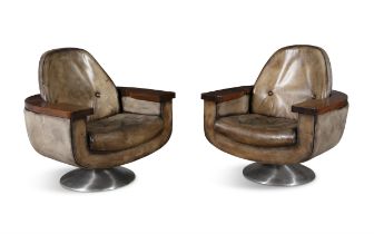 PETER HOYTE A pair of armchairs by Peter Hoyte in rosewood and leather, on a brushed aluminium