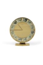 A BRASS JAEGER LECOULTRE DESK CLOCK, the dial with depictions of animals at the hour marks,