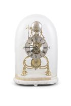 A POLISHED BRASS CHIMING SKELETON CLOCK, in the Gothic taste, surmounted by bell and striking