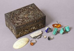 Seven dress rings; two brooches; & an ornate metal jewellery box; 12.75cm wide.