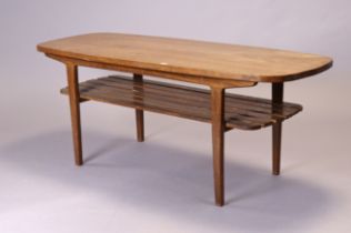 A Ugandan mvule rectangular two-tier coffee table on four square tapered legs, 122.5cm wide x 48.