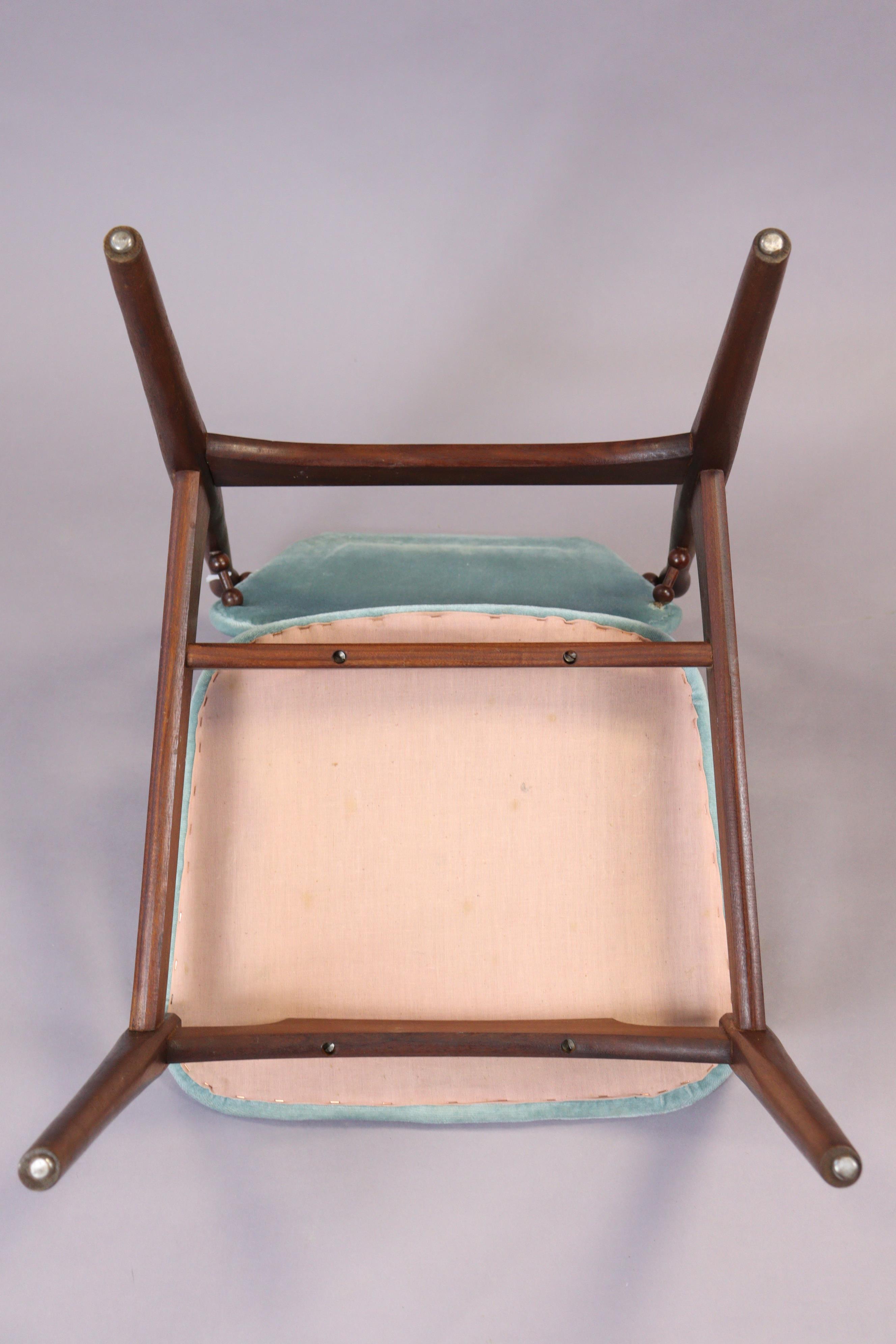 A mid-century teak carver chair having a padded seat & back upholstered blue velour, & on round tape - Image 7 of 7