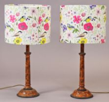 A pair of turned wooden table lamps with painted scumble finish, with shades.