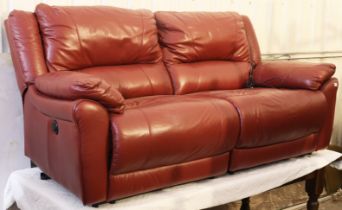 A burgundy leather three-seater electric-operated reclining settee, 198cm long.