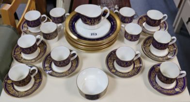 A Royal Worcester fine bone china “Sandringham” twenty-four piece part coffee service; & a set of