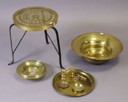 A brass pierced circular trivet on three wrought-iron legs, 33cm dia x 38cm high; a brass tea-urn,