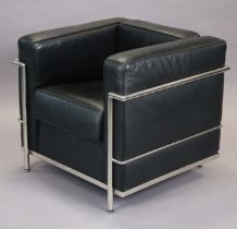 A modern tub-shaped armchair after a design by Le Corbusier, with loose cushions, padded back and
