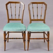 A pair of Victorian beech, oak and ebonised bedroom chairs in the manner of Charles Beaven, each