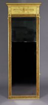 A Regency giltwood & gesso tall narrow pier glass, inset two-piece rectangular mirror plate in a