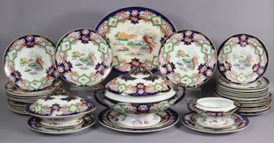 A 19th century Ashworths ironstone dinner service decorated in coloured enamels with chinoiserie lan