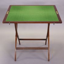 A 19th century mahogany folding card table (possibly converted from a coaching table), inset green