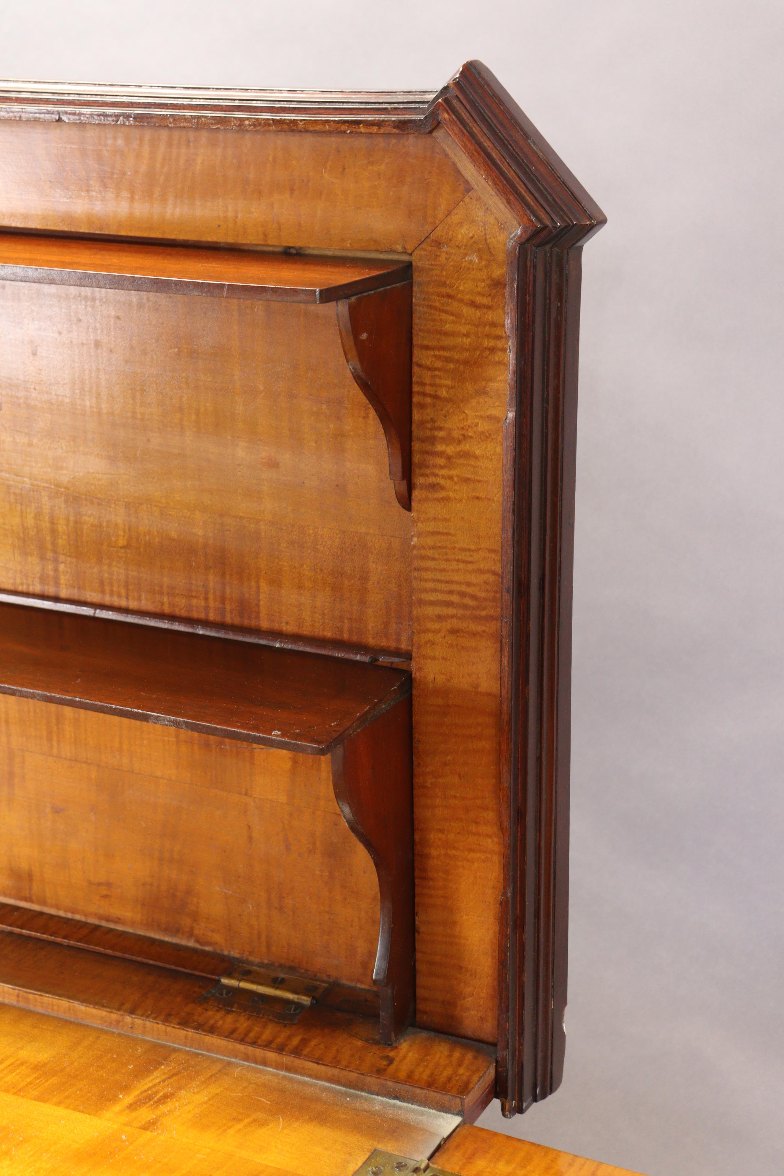 An early 19th century French mahogany buffet, the hinged top enclosing folding shelves, two frieze - Image 7 of 14