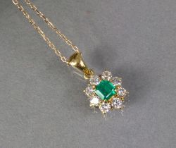 AN EMERALD & DIAMOND PENDANT, the centre square step-cut emerald set within a border of eight