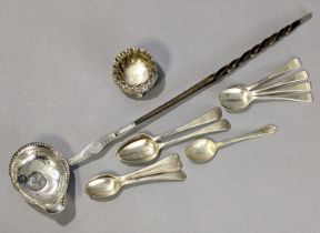 A Georgian un-marked silver punch ladle, the oval bowl inset Queen Anne 1711-shilling, whale-bone