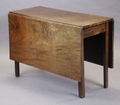 A George III mahogany pembroke table with wide drop-leaves, fitted end drawer, on square chamfered