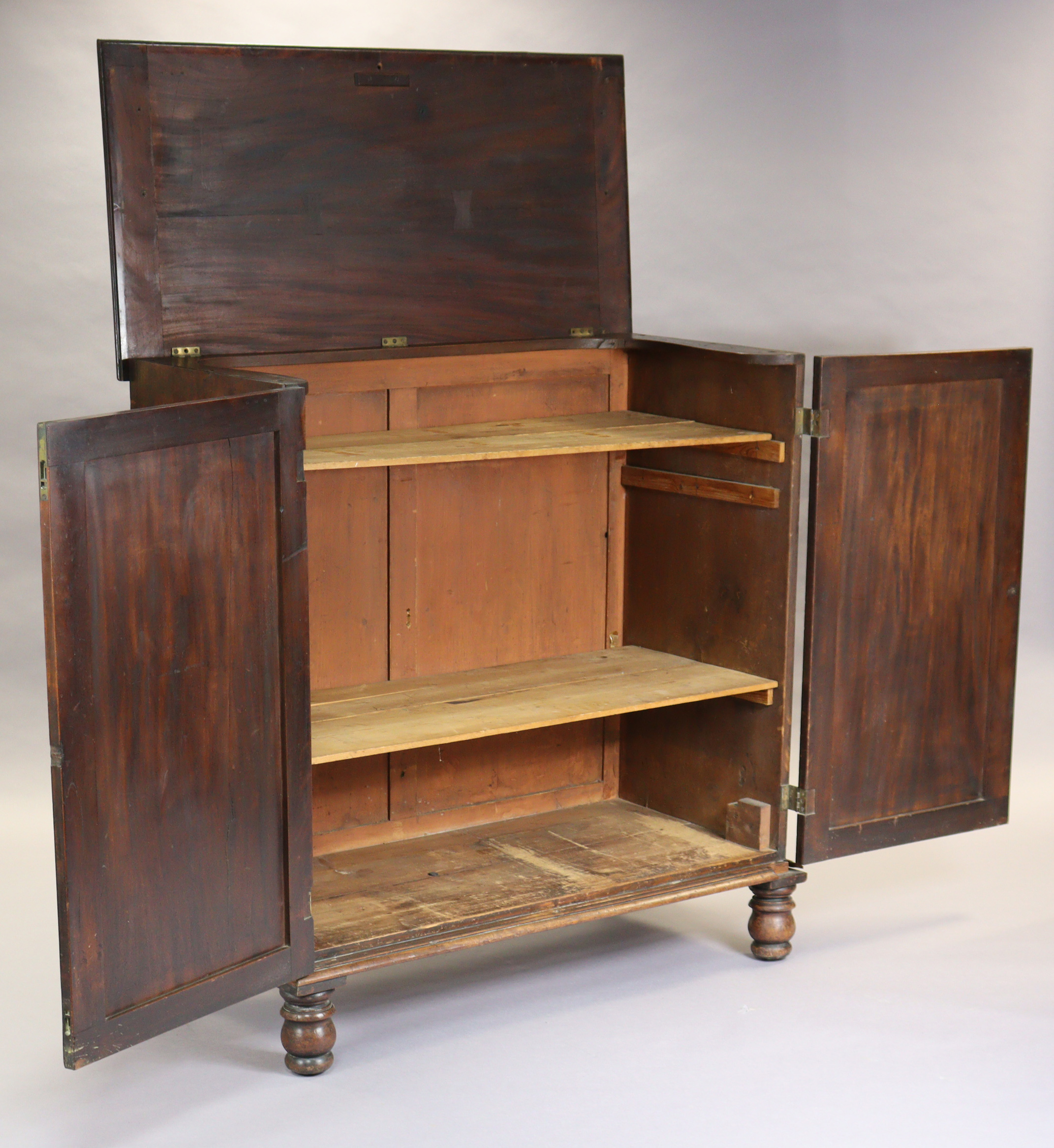A Georgian mahogany hall cupboard, enclosed by a pair of fielded panel doors with turned handles, - Image 2 of 3