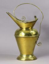 A late 19th century Christopher Dresser (for Benham & Froud) brass water jug, of eastern design with