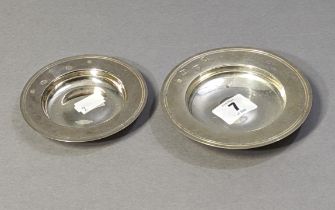 A modern silver ‘Armada’ dish, 11.5cm dia., Chester 1962; & a smaller ditto, 9.8cm; Sheffield