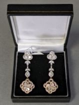 A PAIR OF DIAMOND DROP EARRINGS, of ‘chandelier’ design, set pear-shaped & round-cut diamonds to