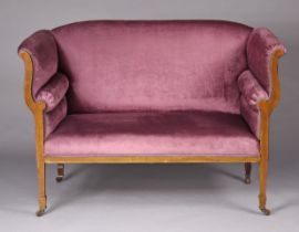 A late 19th/early 20th century inlaid mahogany sofa upholstered mauve velour, on square tapered legs