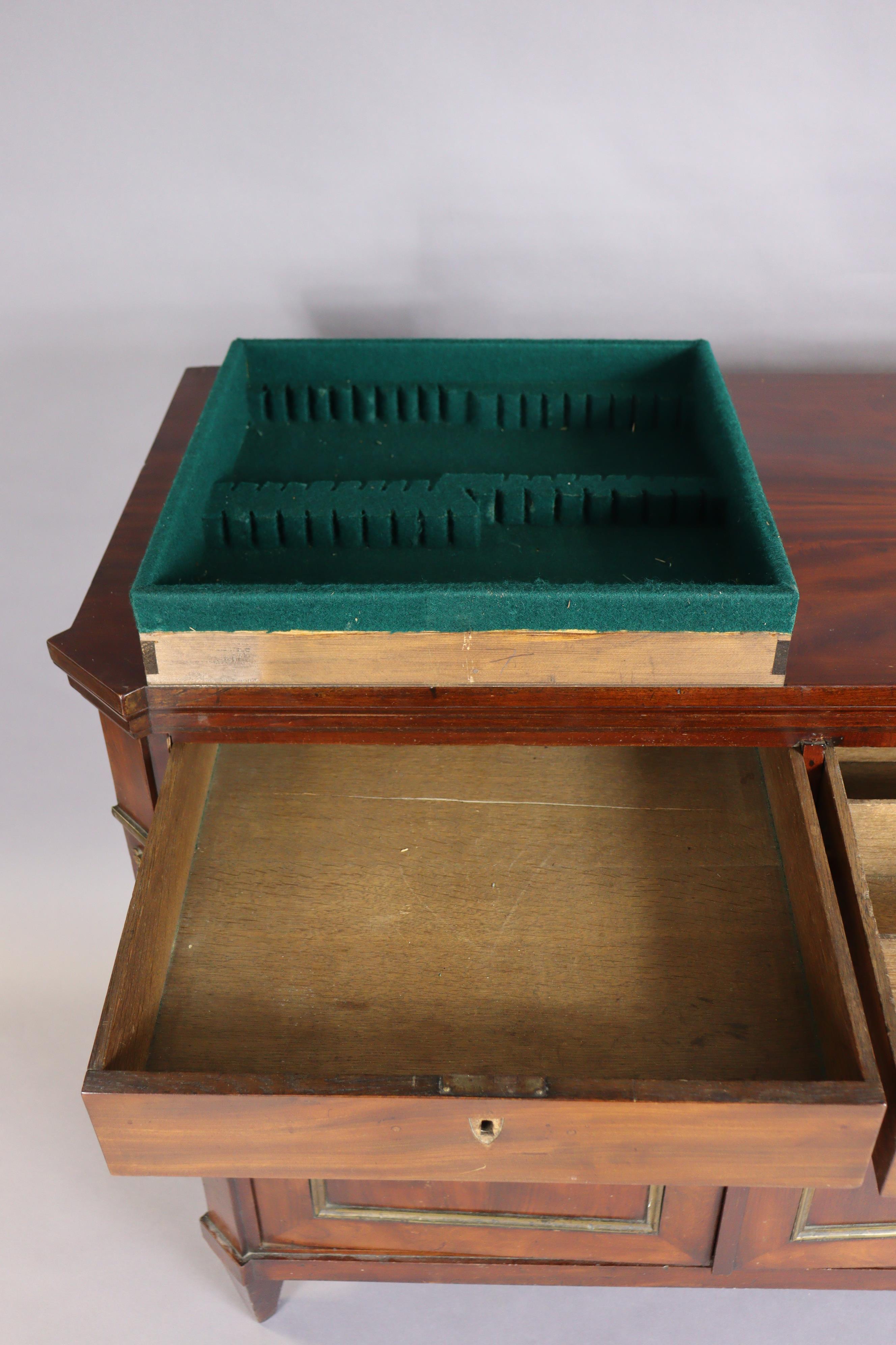 An early 19th century French mahogany buffet, the hinged top enclosing folding shelves, two frieze - Image 4 of 14